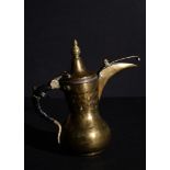 A MIDDLE EASTERN BRASS COFFEE POT, ARABIC, 19TH CENTURY