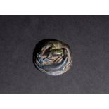 SPARTAN BASALT SEALSTONE INTAGLIO DEPICTING TWO ALIGATORS EATING A RAM, 1450BC-1350BC LATE MINOAN II