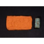 A WESTERN ASIATIC TURQUOISE COLOURED STONE CYLINDER SEAL