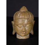 A SOAPSTONE BUDDHA HEAD