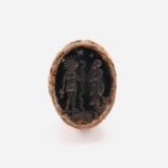 GNOSTIC COPTIC MAGICAL GEMSTONE SET ON IRON RING, DEPICTING A MERMAID & A GOD, CIRCA 3RD CENTURY