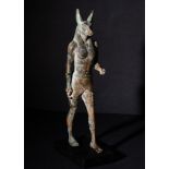 AN EGYPTIAN BRONZE ANUBIS LATE PERIOD, DYNASTY XXVI-XXX, 664-343 B.C.