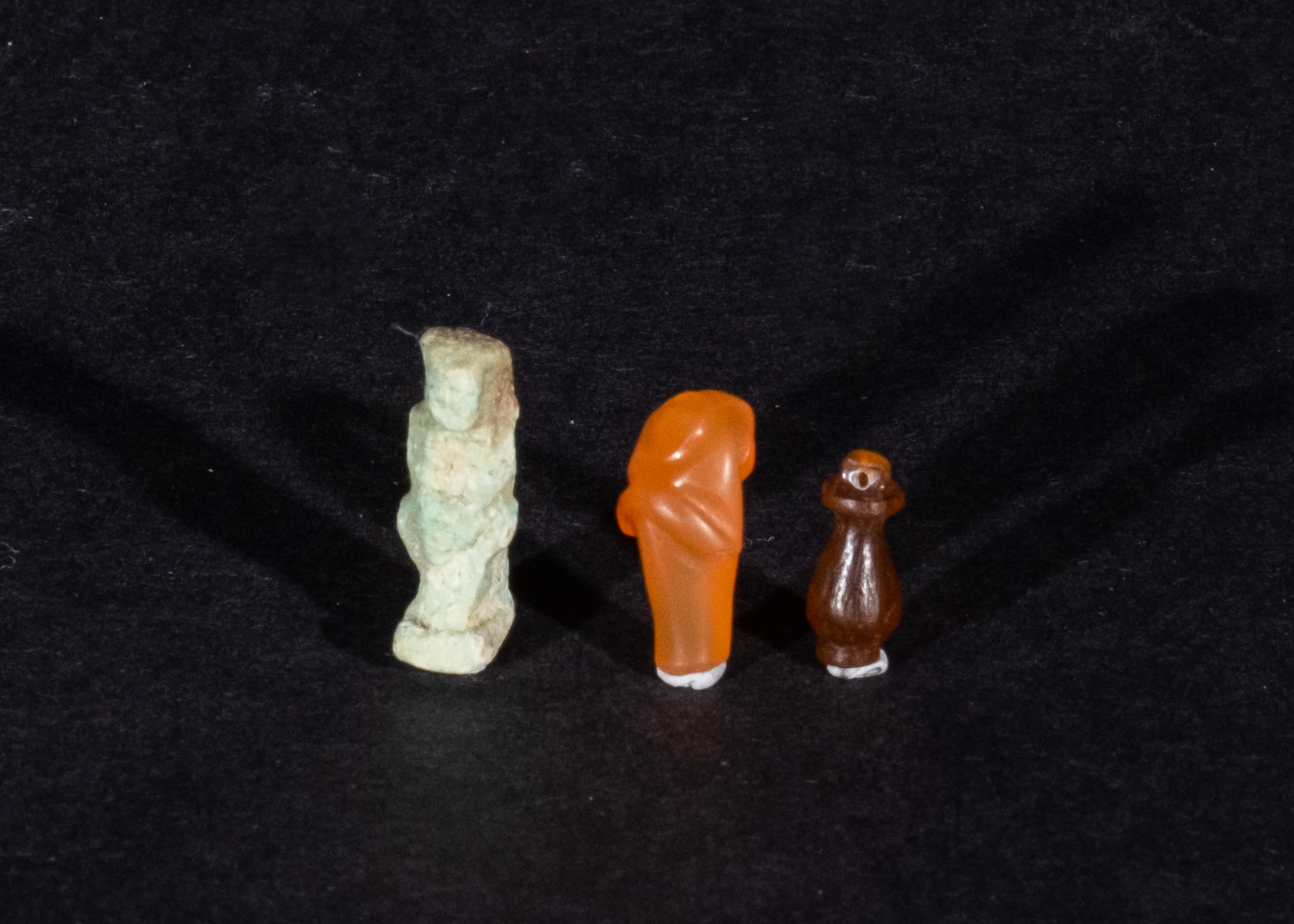 THREE EGYPTIAN HARDSTONE AMULETS