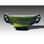 A CHINESE SPINACH JADE DOUBLE HANDLED CUP, QING DYNASTY (1644-1911)