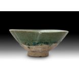 AN ISLAMIC GREEN TURQUOISE GLAZED BOWL, 11TH CENTURY