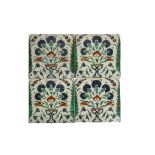 A SET OF FOUR FLORAL IZNIK TILES, OTTOMAN EARLY 17TH CENTURY