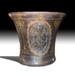A FINE QAJAR GOLD-DAMASCENED STEEL FIGURAL CUP, IRAN 19TH CENTURY