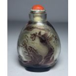 A CHINESE PEKING GLASS SNUFF BOTTLE, QING DYNASTY (1644-1911)