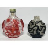 TWO CHINESE PEKING GLASS SNUFF BOTTLES, QING DYNASTY (1644-1911)