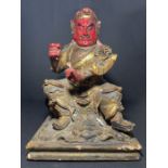 A CHINESE TIBETAN CARVED WOODEN BUDDHA, 19TH CENTURY