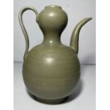 A CHINESE CELADON EWER, PROBABLY SONG DYNASTY OR LATER