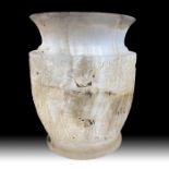 A CARVED SHELL TYPE JAR, POST SASANIAN STYLE AND PROBABLY LATER