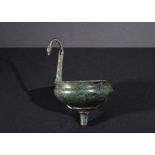 AN EXTREMELY RARE A PERSIAN PERIOD BRONZE FUNNEL WITH A SWAN HEAD HANDLE, 1ST MILLENNIUM B.C.