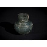 A POST SASANIAN CUT GLASS BOTTLE, 6TH-8TH CENTURY A.D