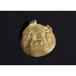 A GOLD PENDANT NIKE RIDING QUADRUPLE HORSES IN THE STYLE OF HELLENISTIC