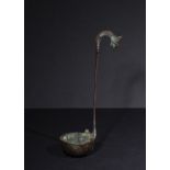 A GRECO PERSIAN PERIOD BRONZE LADLE WITH A GOAT HEAD, 400-300 B.C.