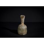 A POST SASANIAN MOULDED GLASS BOTTLE CIRCA 8TH-9TH CENTURY A.D