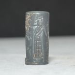 A HEMITATE BABLOYANIAN CYLINDER SEAL, 2ND MILLENIUM B.C.