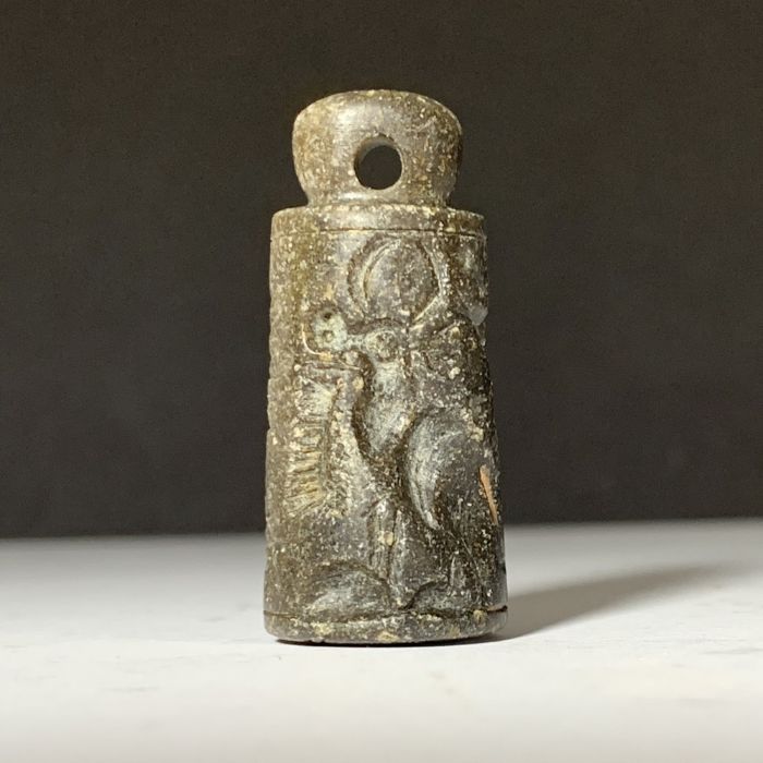 AN EXTREMLY RARE BELL SHAPED URATU INSCRIBED STAMP CYLINDER SEAL PENDANT, CIRCA 8TH CENTURY B.C.