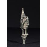 A BRONZE FIGURINE OF A SEATED MUSICIAN PLAYING A HARP, 1ST MILLENNIUM B.C. PROBABLY ANATOLIAN