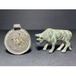 A LURISTAN BULL FIGURE & A SILVER PENDANT, PROBABLY ROMAN