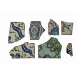 AN ASSORTMENT OF EARLY IZNIK TILE FRAGMENTS, 16TH CENTURY