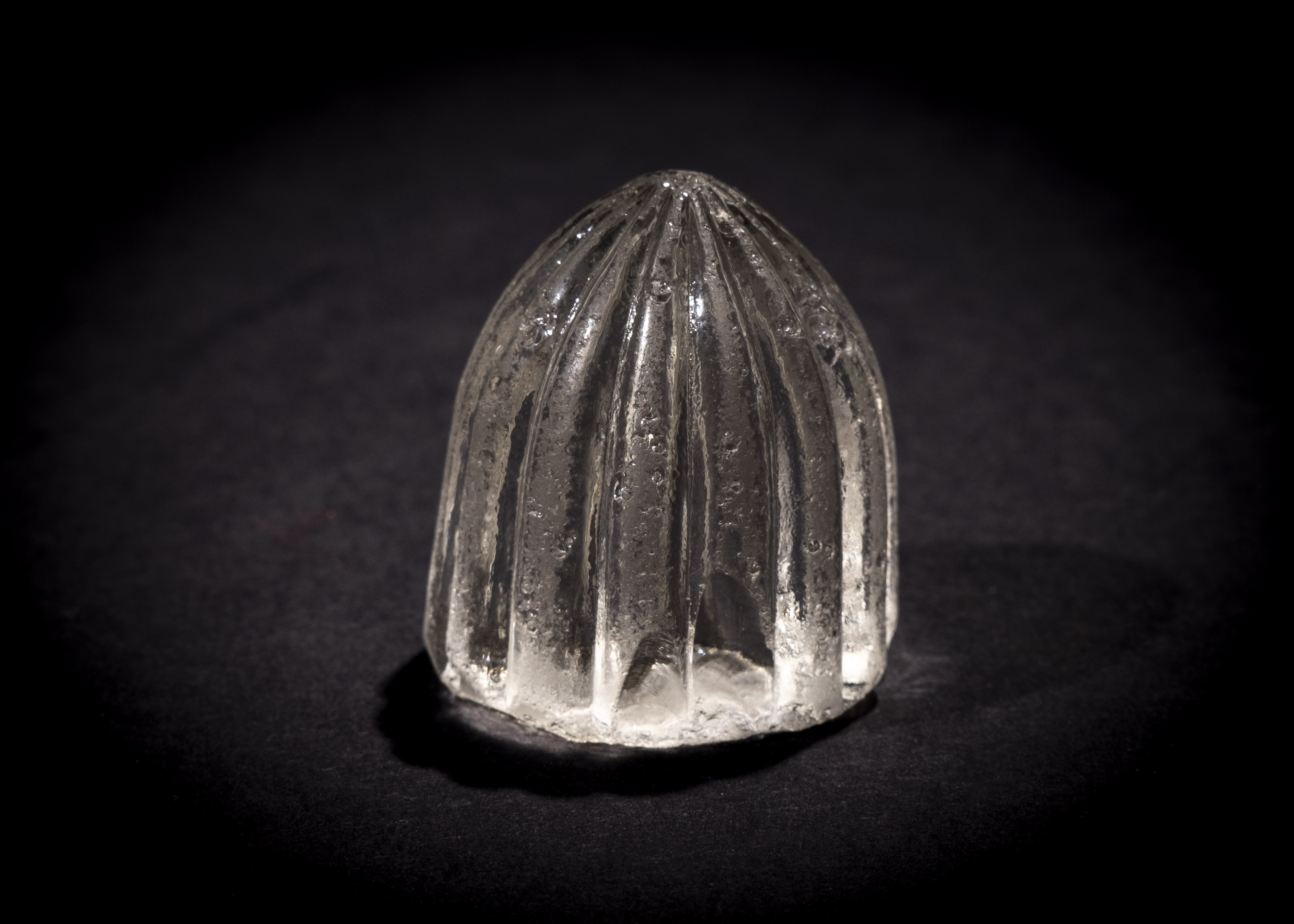 A HIGHLY RARE CARVED ROCK CRYSTAL CHESS PIECE, FATIMID 12TH CENTURY OR EARLIER