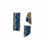 THREE EARLY IZNIK TILE FRAGMENTS, CIRCA 1520, 16TH CENTURY