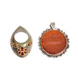 A MUGHAL GEM SET ARCHERS RING & AN ENGRAVED CARNELIAN PENDANT, QAJAR 20TH CENTURY