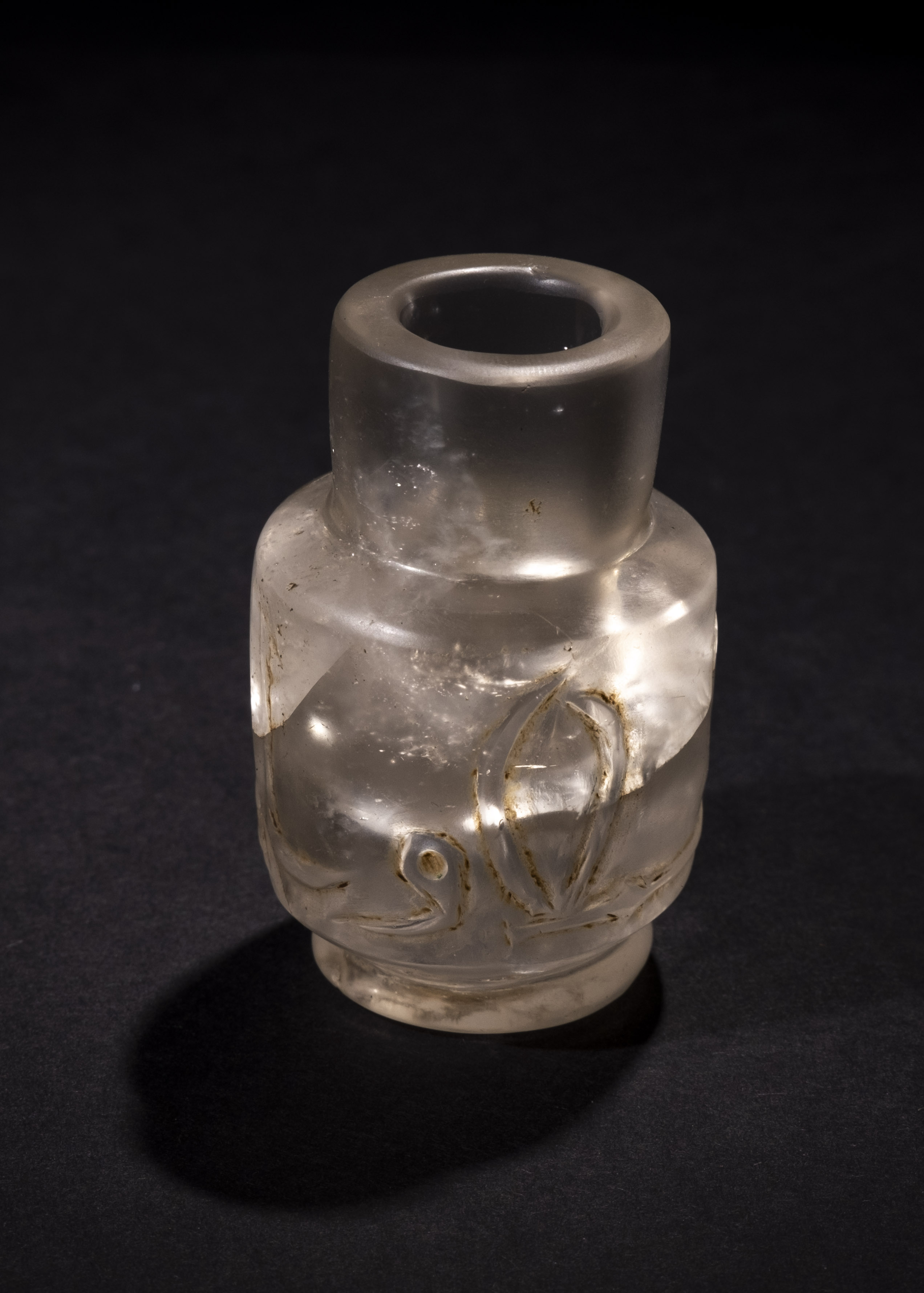 A CARVED ROCK CRYSTAL BOTTLE, FATIMID 11TH/12TH CENTURY