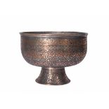 AN EARLY COPPER ENGRAVED QAJAR FOOTED BOWL WITH CALLIGRAPHY, 18TH/19TH CENTURY