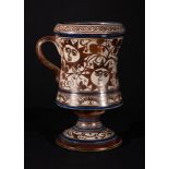 AN HISPANO-MORESQUE COPPER LUSTRE POTTERY FOOTED CUP, 17TH/18TH CENTURY