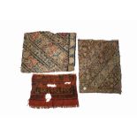 ASSORTMENT OF SAFAVID FLORAL TEXTILE FRAGMENTS, ONE WITH KUFIC INSCRIPTION, 17TH CENTURY OR EARLIER