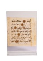 A QURAN LEAF WRITTEN IN MAGHRIBI SCRIPT ON VELLUM ANDALUSIA OR NORTH AFRICA, 13TH/14TH CENTURY