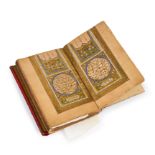 AN ILLUMINATED OTTOMAN QURAN, SIGNED MOHAMAD HELMI & DATED 1282AH, "THE STUDY OF ALI ALWASFI"