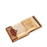 A MINIATURE MAGHREBI MANUSCRIPT PRAYER BOOK, 17TH CENTURY NORTH AFRICA PROBABLY MOROCCO