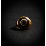 A DZI BEAD EYE RING SET ON GOLD