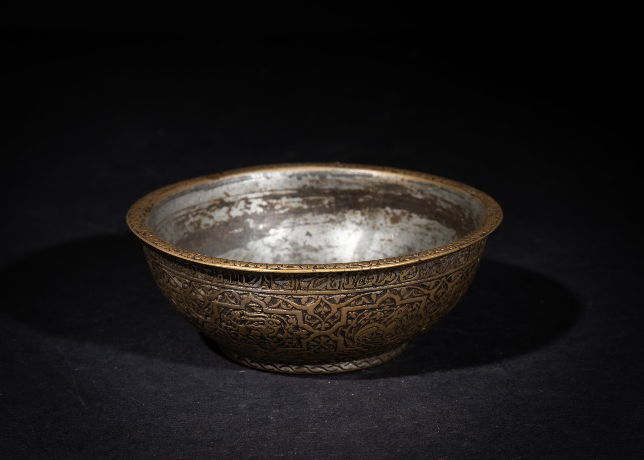 AN INSCRIBED SAFAVID TINNED COPPER BOWL, SIGNED MOHAMMAD SOLTANI, 17TH CENTURY
