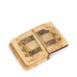 A HIGHLY RARE ILLUMINATED MINIATURE QURAN, NEAR EAST, 13TH CENTURY PROBABLY ILKHANID