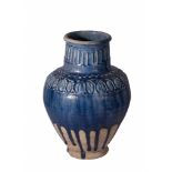 A RAQQA COBALT BLUE GLAZED POTTERY VASE, FIRST HALF 13TH CENTURY