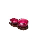 A RUBY GLASS DOUBLE GOURD SHAPED BOX ON A ROSE WOODEN STAND, QIANLONG MARK & PERIOD (1736-1795)