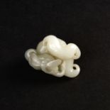 A CHINESE WHITE JADE DRAGON FLY GROUP, 18TH CENTURY, QING DYNASTY (1644-1911)