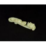 A CHINESE WHITE JADE BELT HOOK, QING DYNASTY (1644-1911)