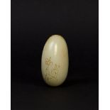 A CHINESE CARVED WHITE JADE PEBBLE, 18TH/19TH CENTURY, QING DYNASTY (1644-1911)