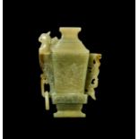 A CHINESE RUSSET JADE ARCHAIC SHAPE LIDDED BOTTLE, QING DYNASTY (1644-1911)