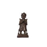 A CHINESE BRONZE FIGURE OF A PRAYING MAN, QING DYNASTY (1644-1911)