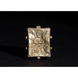 A GOLD BYZANTINE PENDANT WITH A DEPICITON OF CHRIST WITH A LATIN INSCRIPTION "ICXC"