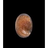 A PINK GEM STONE CAMEO OF A NOBLE MAN, PROBABLY GRAND TOUR PERIOD