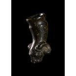 AN OBSIDIAN DRINKING RHYTON PENDANT, HELLENISTIC PERIOD, CIRCA 2ND CENTURY B.C. OR LATER