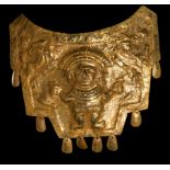 A GOLD MOCHE BREASTPLATE PECTORAL DEPICTING WARRIORS, CIRCA 6TH-7TH CENTURY, PERU